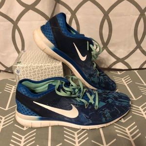 Blue and mint Nike shoes